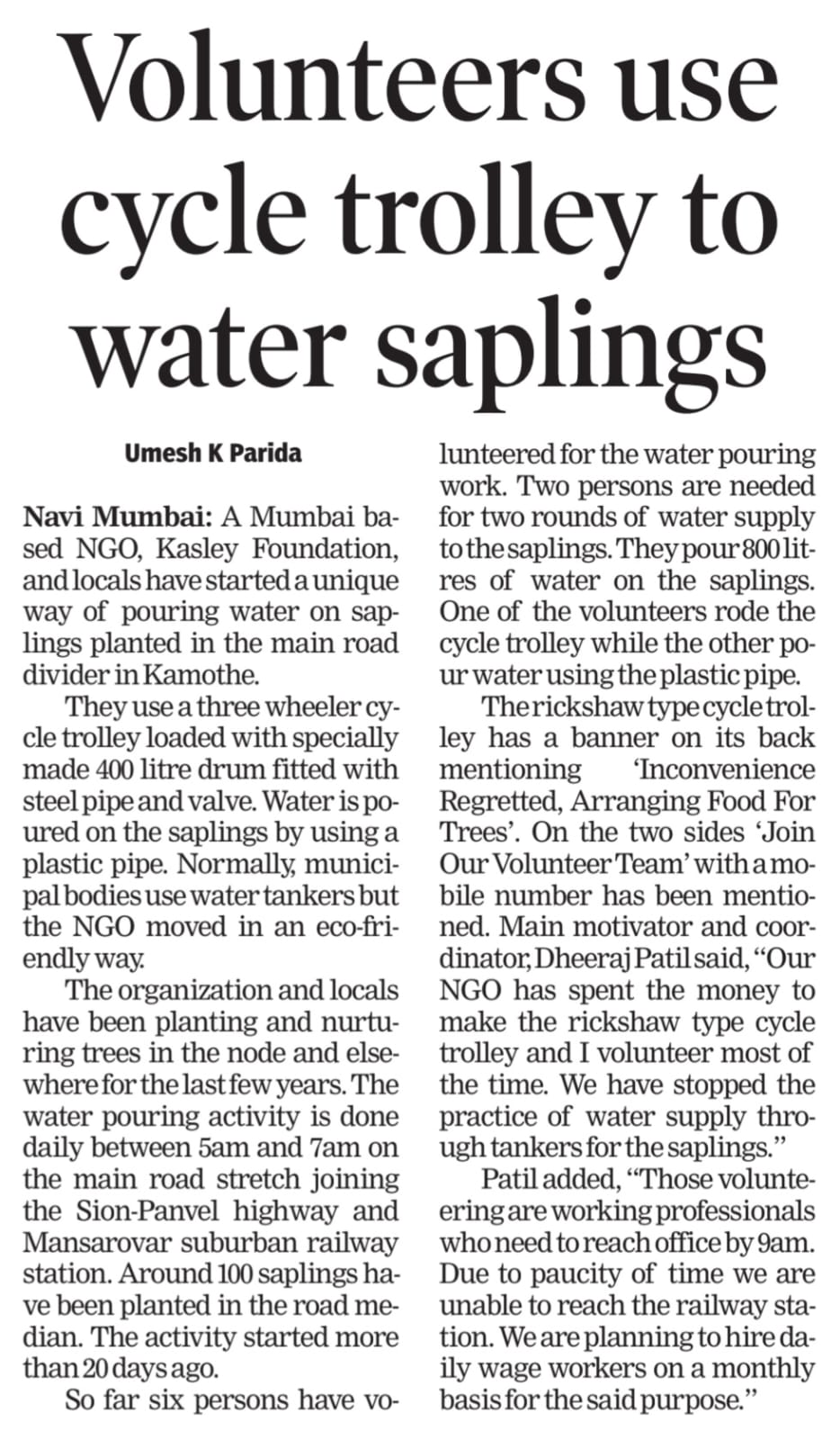 Volunteers use cycle trolley to water saplings